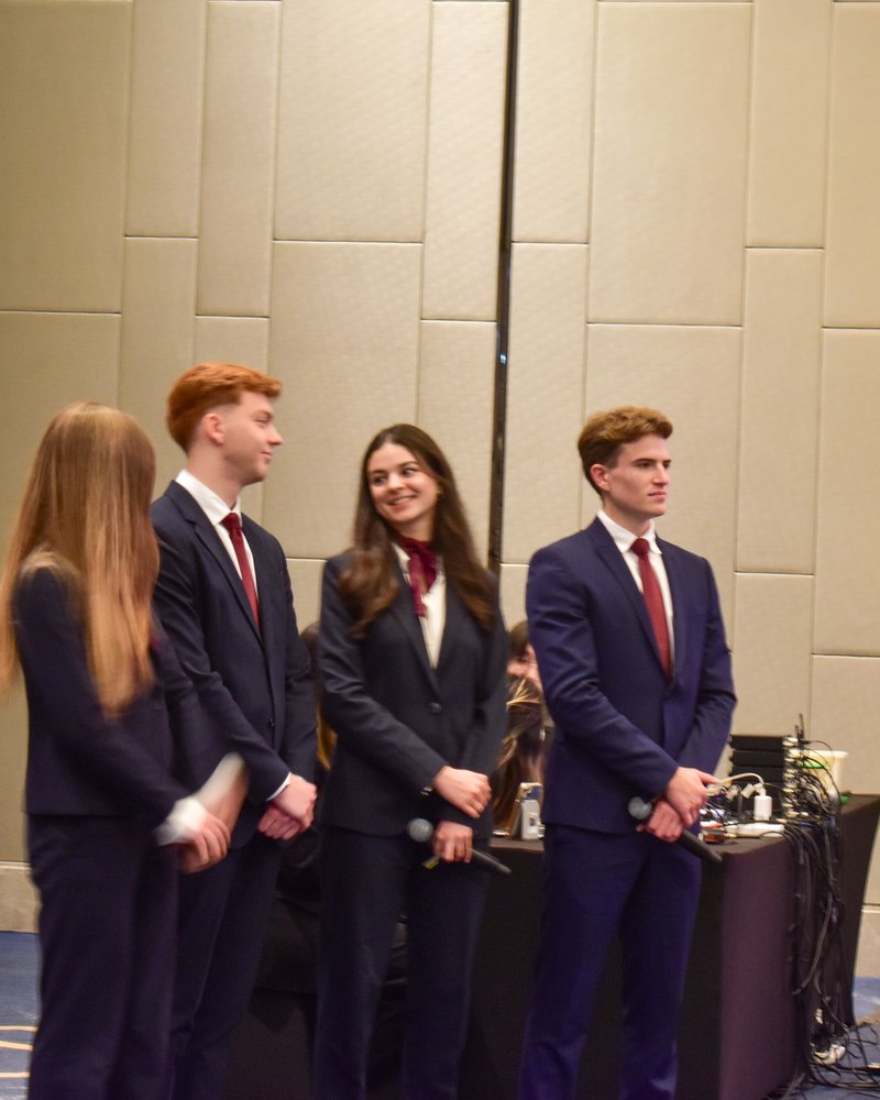 Rebecca and her team getting ready to go on stage at TUBC